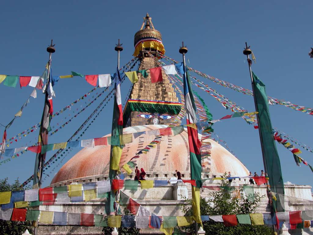 Manaslu 00 08 Kathmandu Boudhanath Kathmandu�s 36m-high Boudhanath Stupa is the largest stupa in Nepal, and one of the largest in the world. It is a religious centre for Nepal's considerable population of Tibetans. It supposedly dates from 5C AD. With three square tiers surrounding the central circle of the dome, Boudhanath is built in the form of a mandala, a symbol of the universe that is often used in Buddhist meditations.